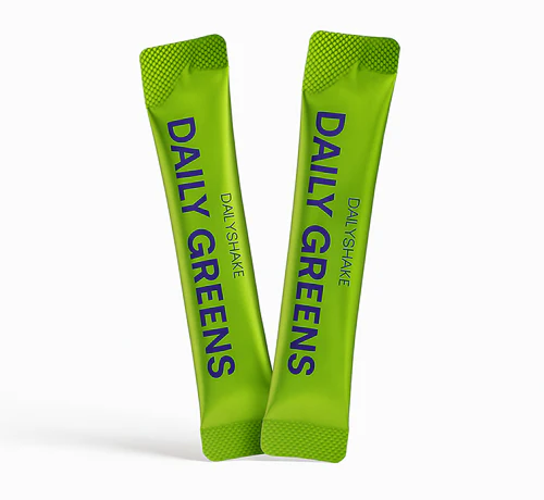 Two green packets of 'Daily Greens' on a white background