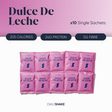 A pack of ten single sachets labeled 'Dulce De Leche' with nutritional information stating 205 calories, 24g protein, and 5g fibre.